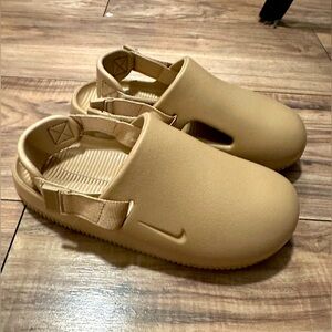 Size 4, Nike clogs, tan color